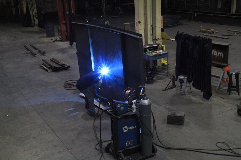 welding large metal fabrication in a shop